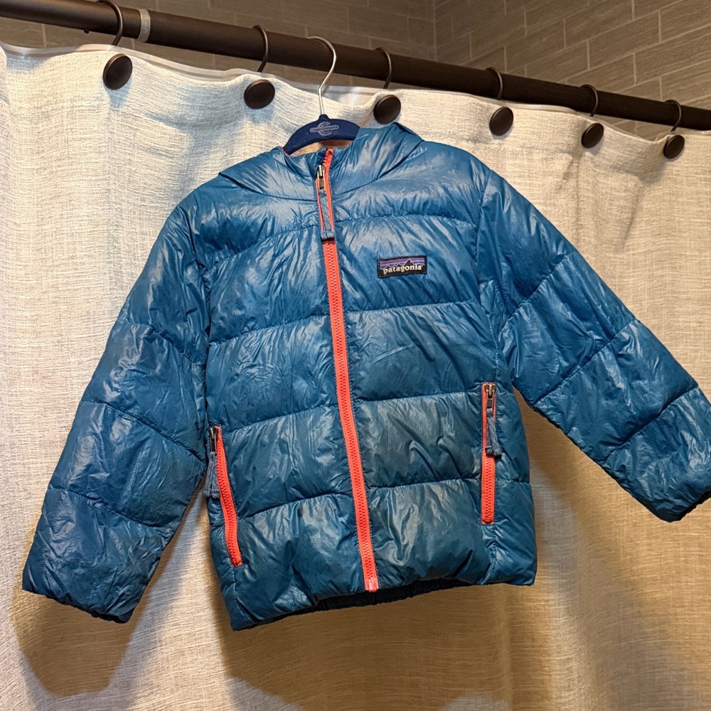 Patagonia Kids Blue Puffer Jacket, has slight discoloration on front.